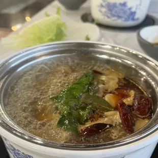 My Szechuan broth boiling w/ the ingredients added