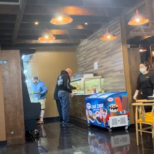 The sauces, hot pot fixins and ingredients, and dessert area / bar.