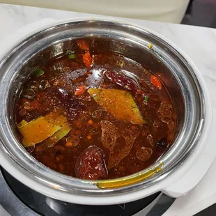 a pot of stew on a stovetop
