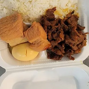 $10 plate. Pork very tough.