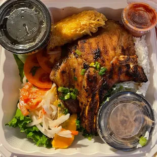 V#48 Huong Lan Special: Charbroiled Pork Chop, Egg Patty, Shrimp Cake and Shredded Pork Over Rice.