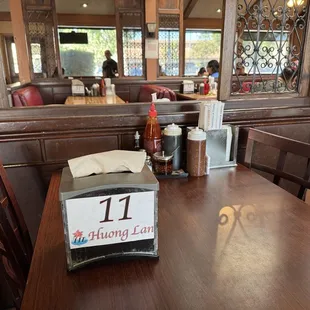 Dining room has a mix of booths and movable tables &amp; chairs. @Fresno_HuongLan