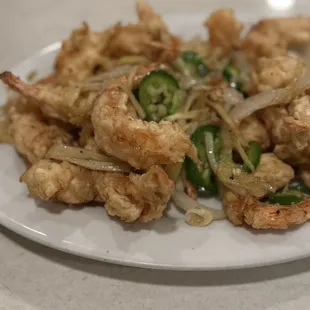 Crispy shrimp with sautéed onions, ginger, and jalapeños
