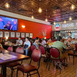 people eating and drinking