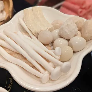 Mushrooms, tofu, fish balls, and quail eggs