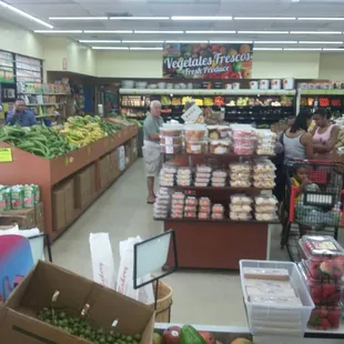 a woman shopping in a grocery store