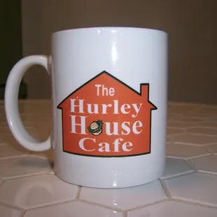 the logo on a coffee mug