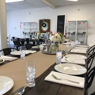 a dining table with place settings