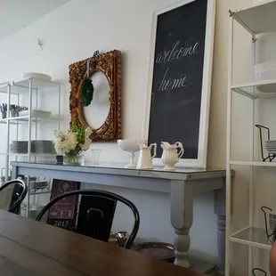 a dining room with a table and chairs