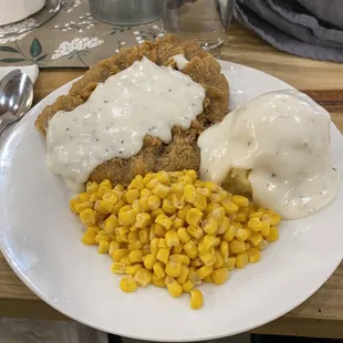 Chicken fried steak with mashed potatoes and pepper gravy