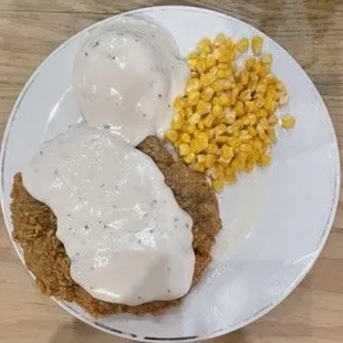 Chicken fried steak with gravy.