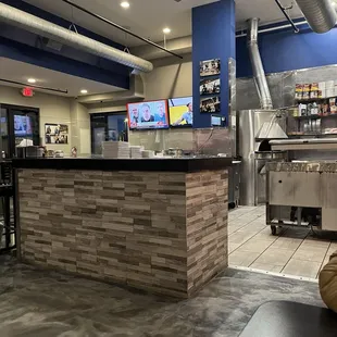 Kitchen work area next to the bar