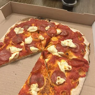 Cheese with no pizza...apparently built your own pizzas only sometimes include shredded cheese.