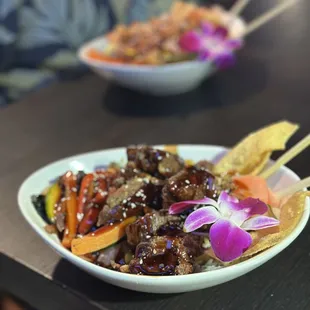 a bowl of asian food