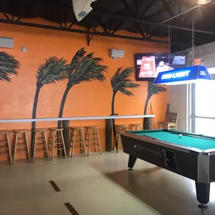 I love the custom painted walls and hurricane related decor.