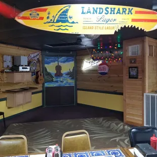 a surfboard hanging from the ceiling