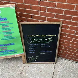 a menu and a chalk board