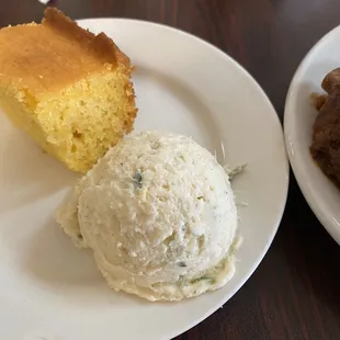 a piece of cake and a scoop of ice cream
