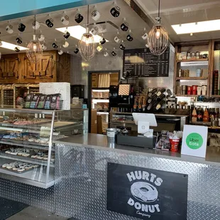 a counter with a variety of donuts