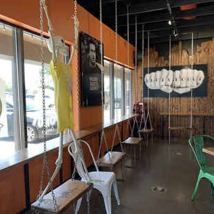 a row of chairs and tables