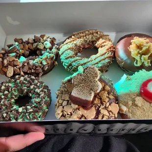 Left to Right and Top to Bottom: Twix, Carmel Delite, German Chocolate Ande&apos;s Mint, S&apos;more, Strawberry Cheesecake