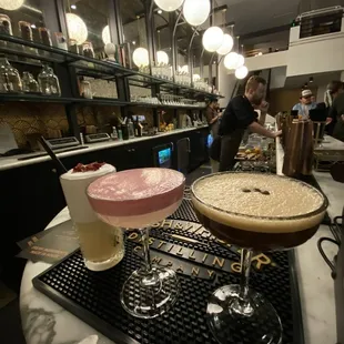 A collection of cocktails at the downstairs bar