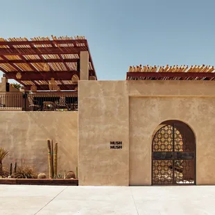 the entrance to a home in the desert
