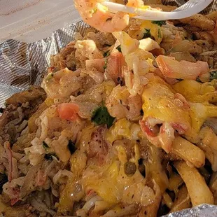 Baby shrimps in the seafood crazy fries,  definitely doesn't match the picture