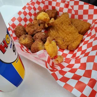 Cat fish, hush puppies, oysters and shrimp.  All nasty.