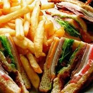 Turkey Club Sandwich with fries and pop for 6.99