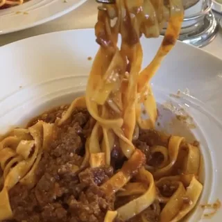 T L.