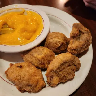 Fried mushrooms with cheese sauce