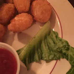 You're joking, right? If you're going to garnish the plate at all, please use a piece of lettuce that's not jacked up and spotted.