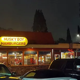cars parked in front of the restaurant
