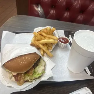 11 something cheeseburger ended up being 15.30 with bacon added it was an extra $4