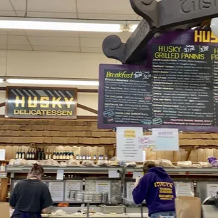 Front of sandwich counter and shopping in the back