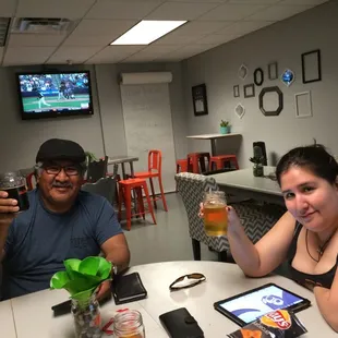 My bro and niece enjoying Rise of Rio and Pineapple Cider.