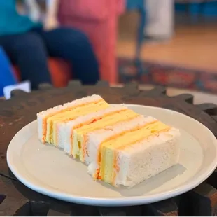 Tamago Egg Sando - milk bread, kewpie mayo, dashi-seasoned omelette, fermented chili paste.