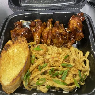 a meal in a styrofoam container