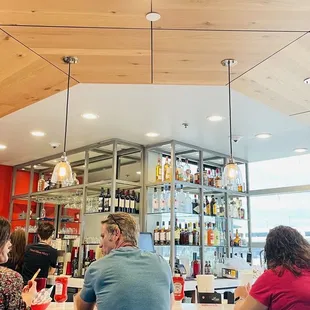 Full bar and you can walk through the airport with your drink  . Only in Austin, Tx.