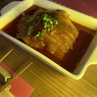 Spicy pork belly with crispy garlic