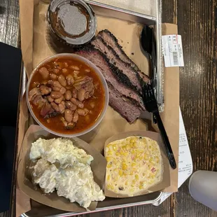 Brisket, potato salad, creamed corn and brisket baked beans..
