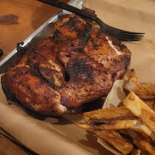 Smoked chicken and fries.