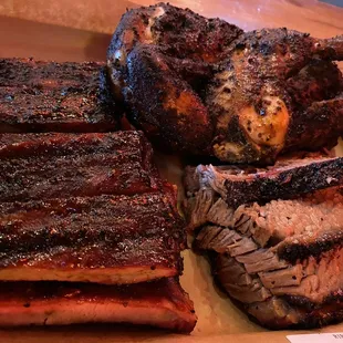 a variety of barbecued meats