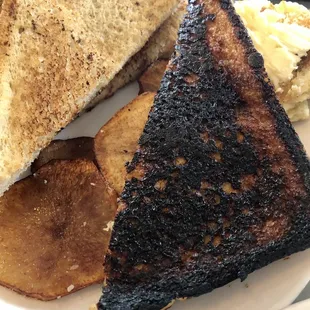 Burned inside of sandwich.  Should&apos;ve never came out of the kitchen.