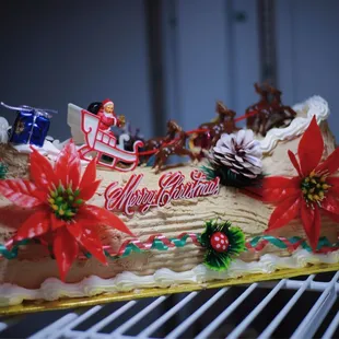 a christmas cake decorated with decorations