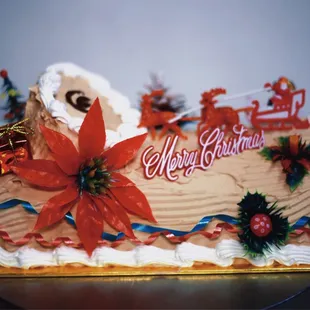 a christmas cake decorated with poins