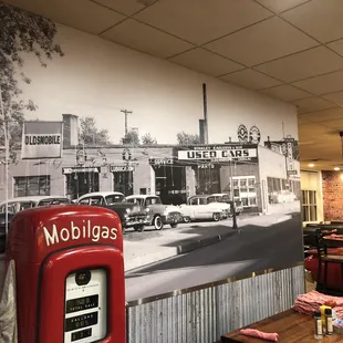 The photo backdrops are of local places in years past