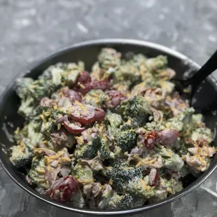 broccoli and grapes in a skillet