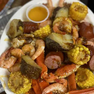 a person holding a plate of food